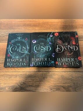 The Coven series (1-3) by Harper L. Woods with sprayed edges.

Not read.